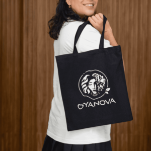 Model carrying Oyanova Black Tote